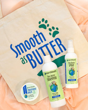 2 bottles of Shea Butter Shampoo, 1 treatment balm and a bag with text "Smooth as Butter" 