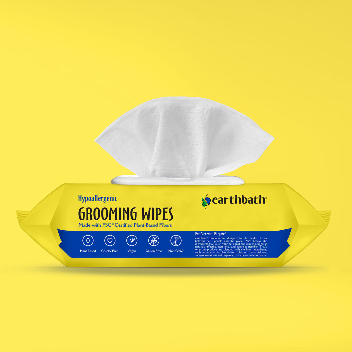 Earthbath grooming wipes packaging on a yellow background