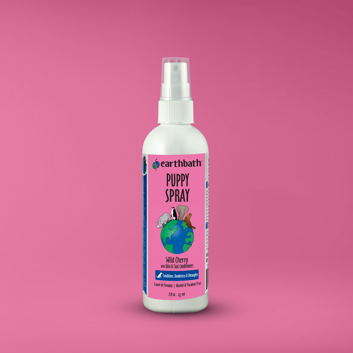 Earthbath Puppy Spray bottle on a pink background