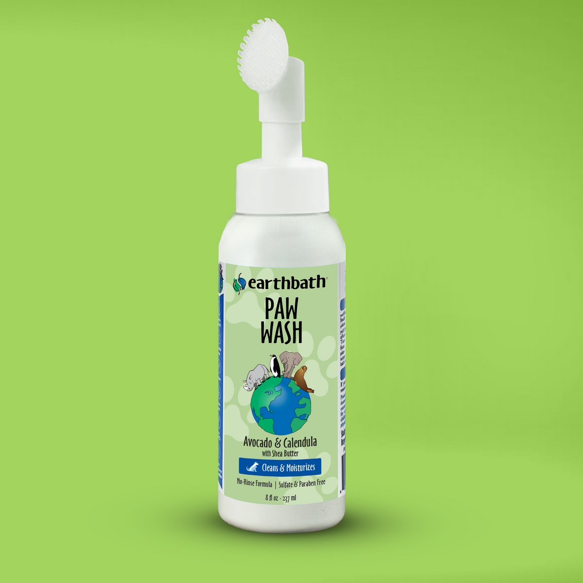 A bottle of earthbath Paw Wash with a white spray pump and a label that shows the product name with an illustration of animals on the front on green background.