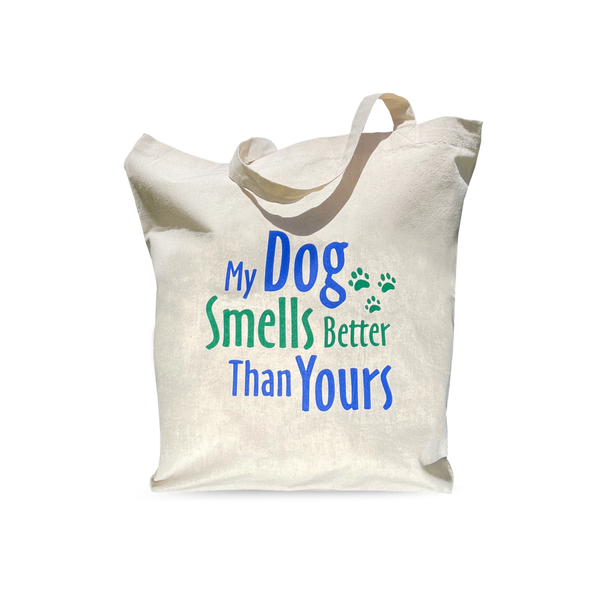 A beige reusable shopping bag with the text 'MY DOG SMELLS BETTER THAN YOURS' printed on the front.